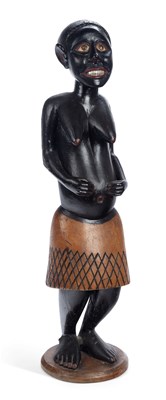 Lot 35 - AN AFRICAN CARVED AND PAINTED WOOD FIGURE OF A WOMAN