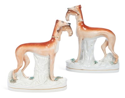 Lot 126 - A PAIR OF STAFFORDSHIRE FIGURES OF GREYHOUNDS