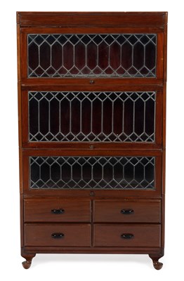 Lot 865 - AN EARLY 20TH CENTURY MAHOGANY STACKING BOOKCASE
