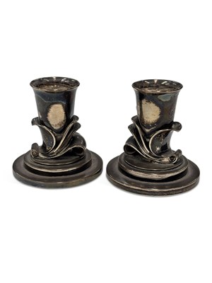 Lot 211 - HARALD NIELSEN FOR GEORG JENSEN: A PAIR OF DANISH STERLING SILVER CANDLESTICKS