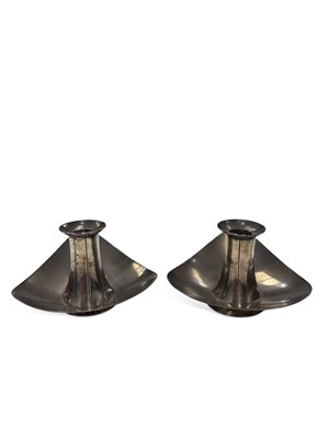 Lot 252 - A PAIR OF ELIZABETH II MODERNIST SILVER CANDLESTICKS
