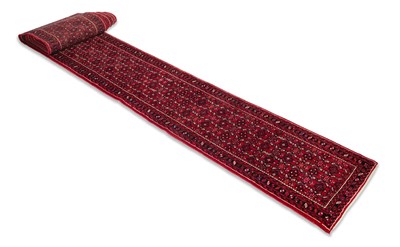Lot 830 - A NORTH WEST PERSIAN RUNNER