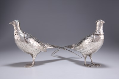 Lot 1012 - A PAIR OF GERMAN SILVER PHEASANT PEPPERS, CIRCA 1890