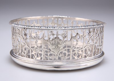 Lot 1446 - A GEORGE III SILVER COASTER