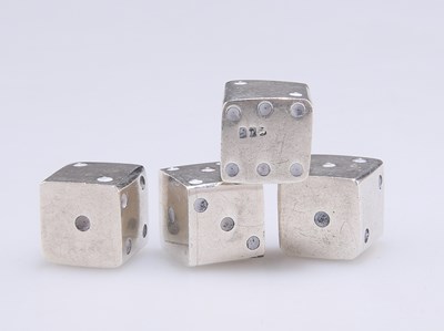 Lot 1455 - A SET OF FOUR DICE