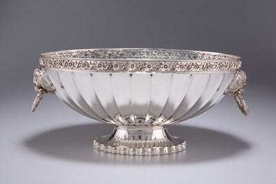 Lot 1253 - A LATE VICTORIAN SILVER-PLATED TWO-HANDLED FLUTED BOWL