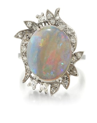 Lot 2383 - A 14 CARAT WHITE GOLD OPAL AND DIAMOND CLUSTER RING