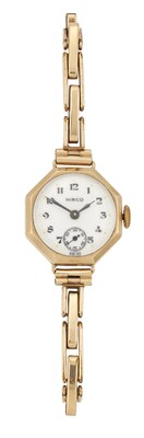 Lot 405 - A LADY'S 9 CARAT GOLD HIRCO WATCH ON A ROLLED GOLD BRACLELET